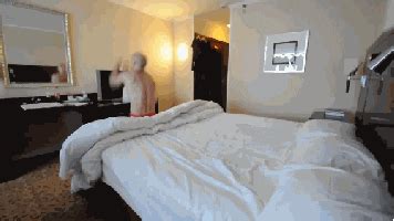 Step mommy and stepson share a bed in a hotel room